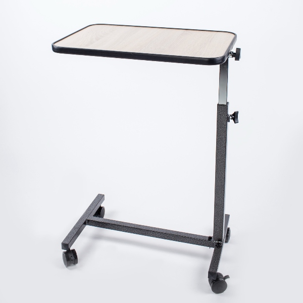 Slimnieka galdiņš virs gultas